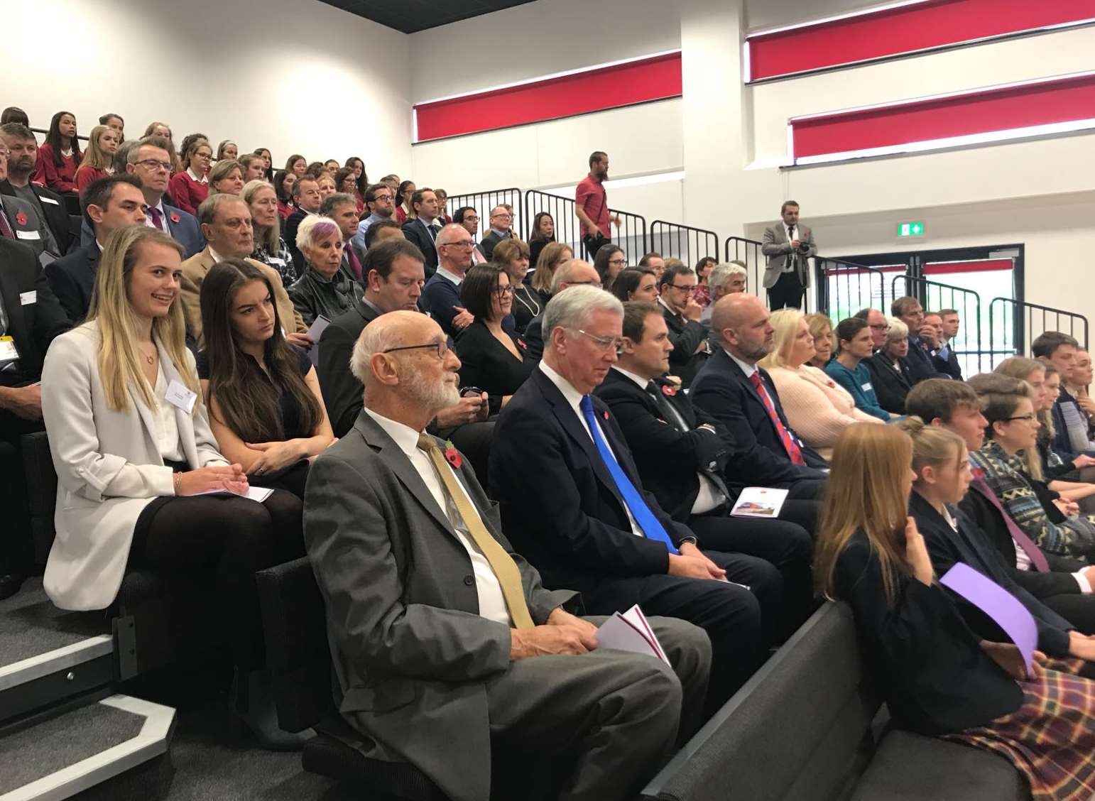 MP Michael Fallon sitting among parents and school officials