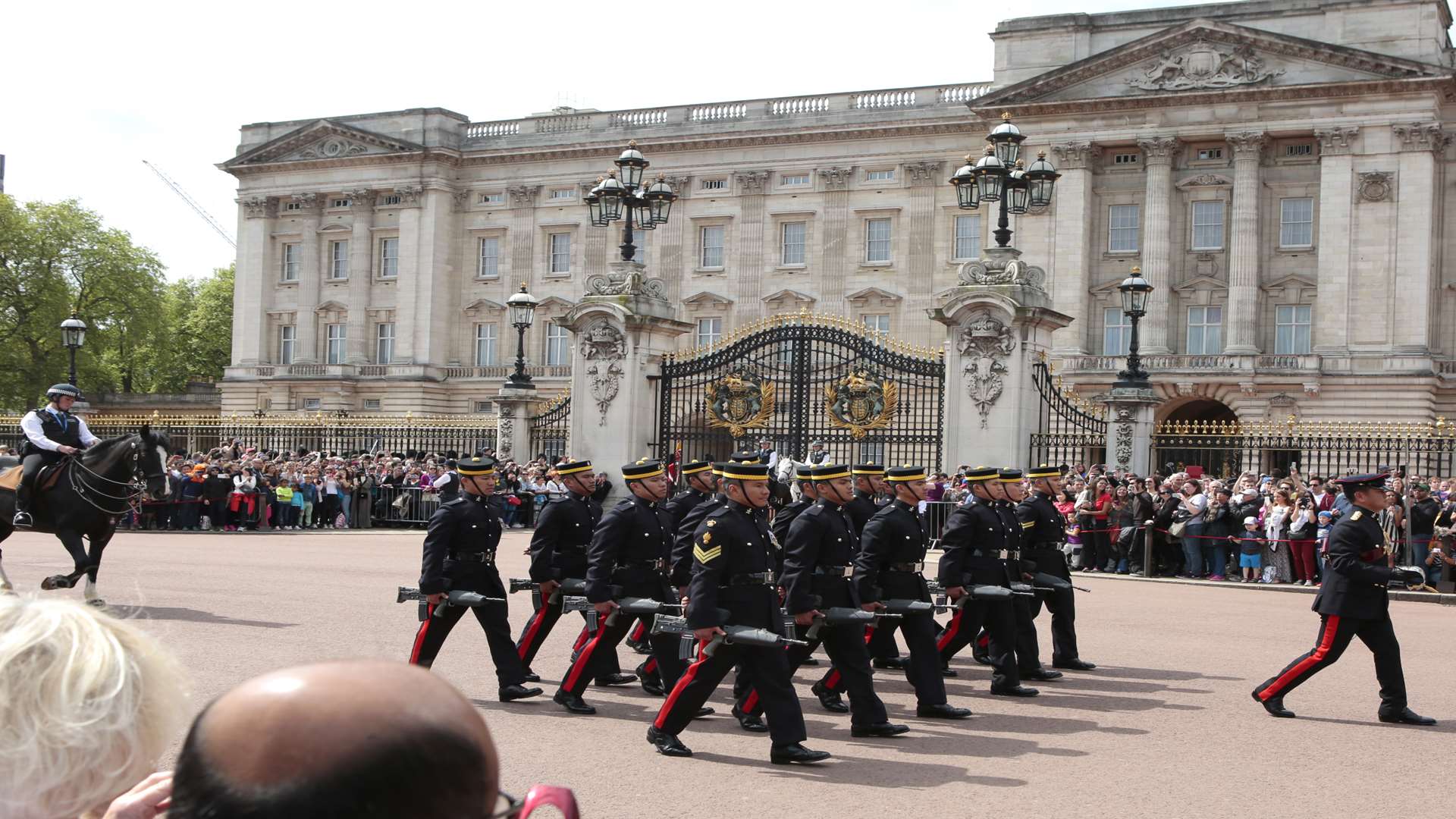 Gurkhas from Maidstone march into Buckingham Palace. Picture: Martin Apps