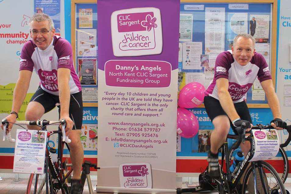 Tony and Nick on static bikes in Tesco, Gillingham