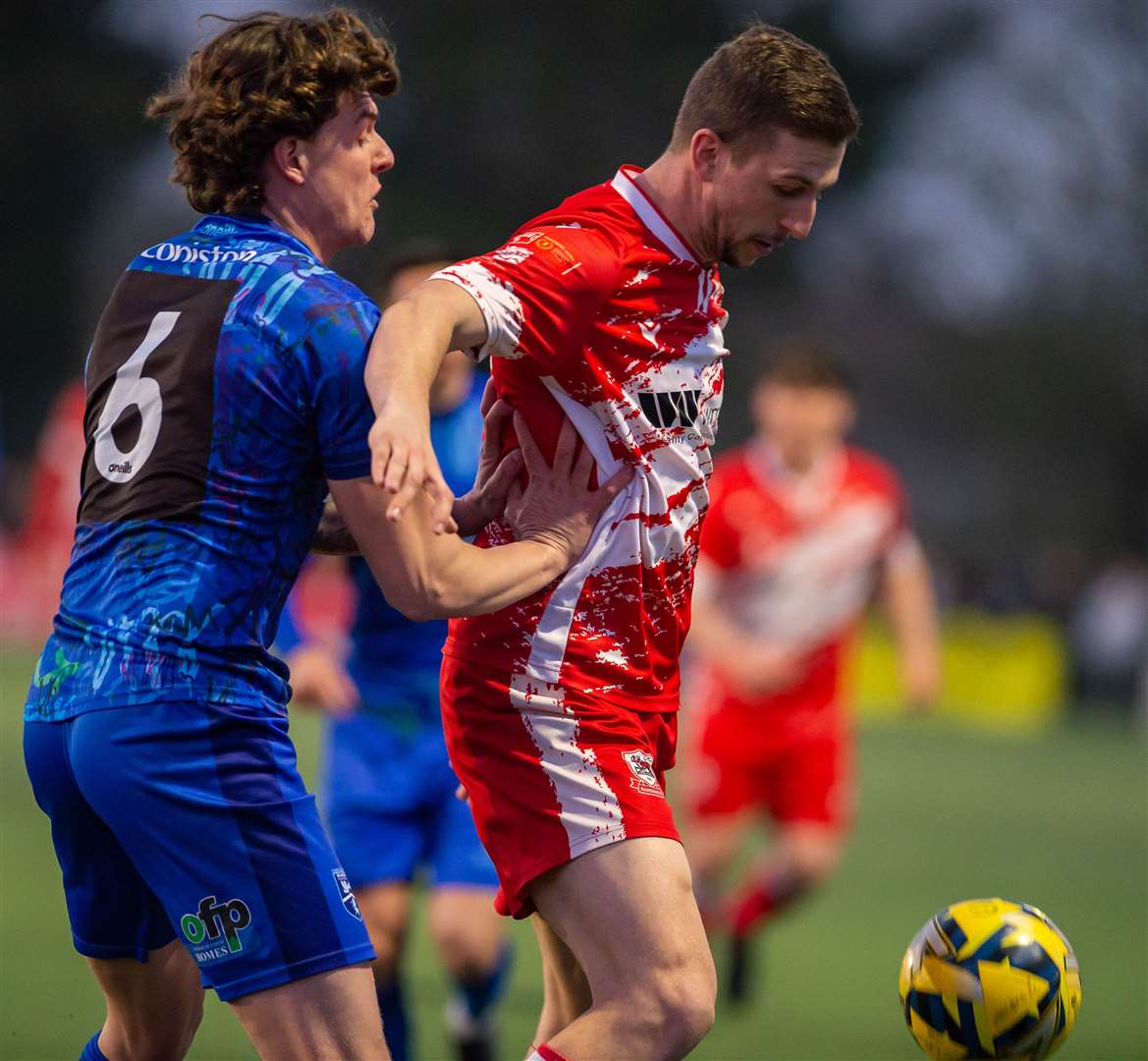 Ramsgate striker Kane Rowland, seen here holding off Harry Hudson, was sent off in Ramsgate's Kent Senior Cup semi-final at Margate. Picture: Ian Scammell