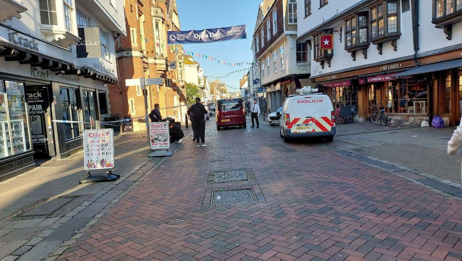 A police cordon remains in place after a man was stabbed to death in Canterbury High Street