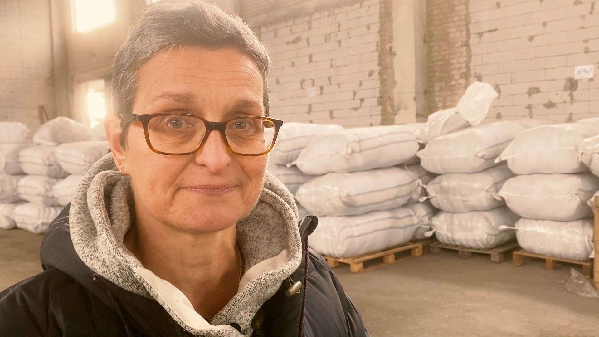 Rachel Harvey, 59, at a warehouse of ShelterBox aid in Ukraine (ShelterBox)