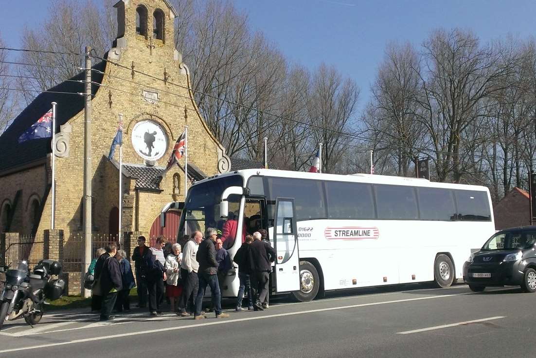 The coach party outside the museum