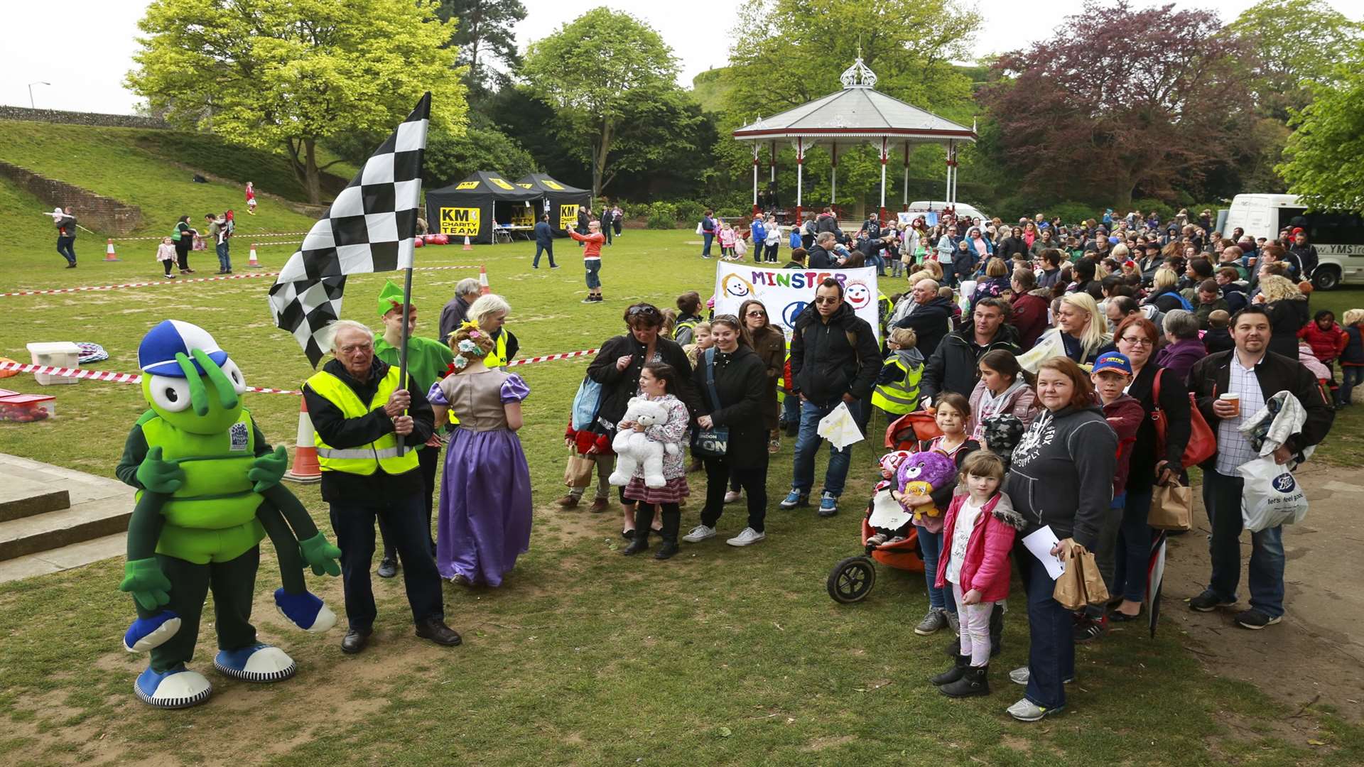 Martin Vye of the KM Charity Team starts the Walking Bus record attempt at Buster's Big Bash in Dane John Gardens, Canterbury.