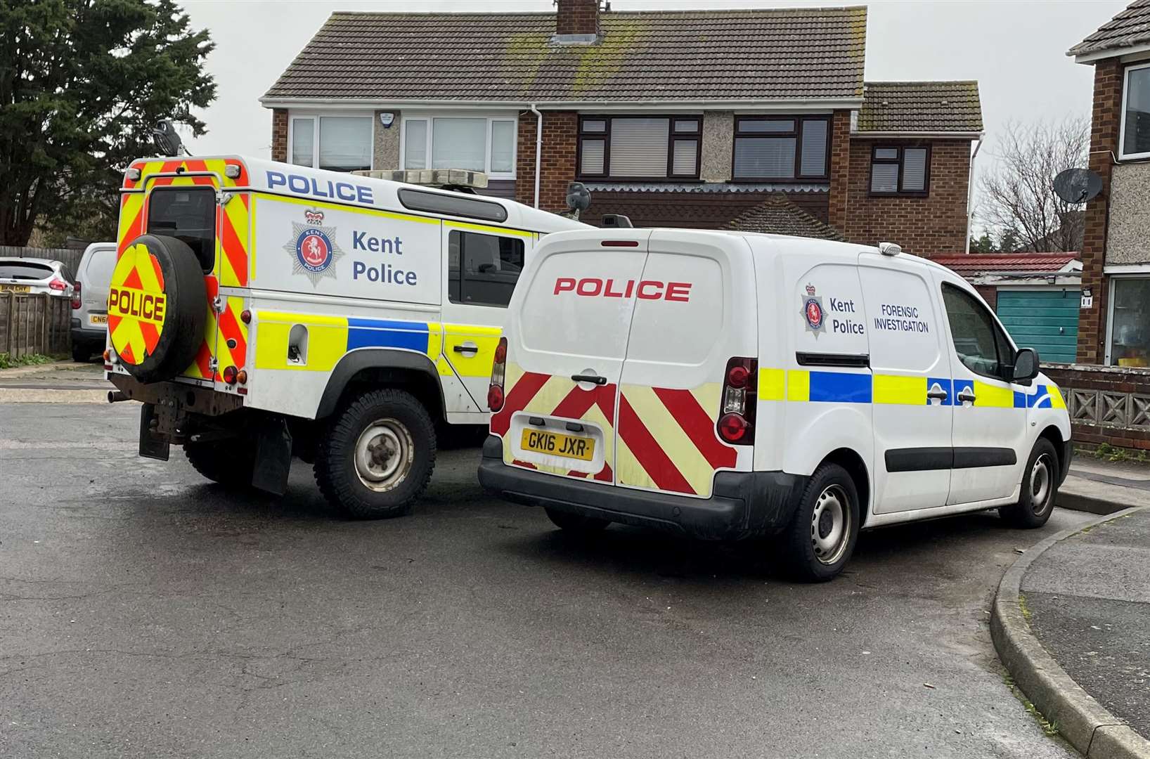 Forensics and officers at the property in Medway Close, Sittingbourne, following the stabbing