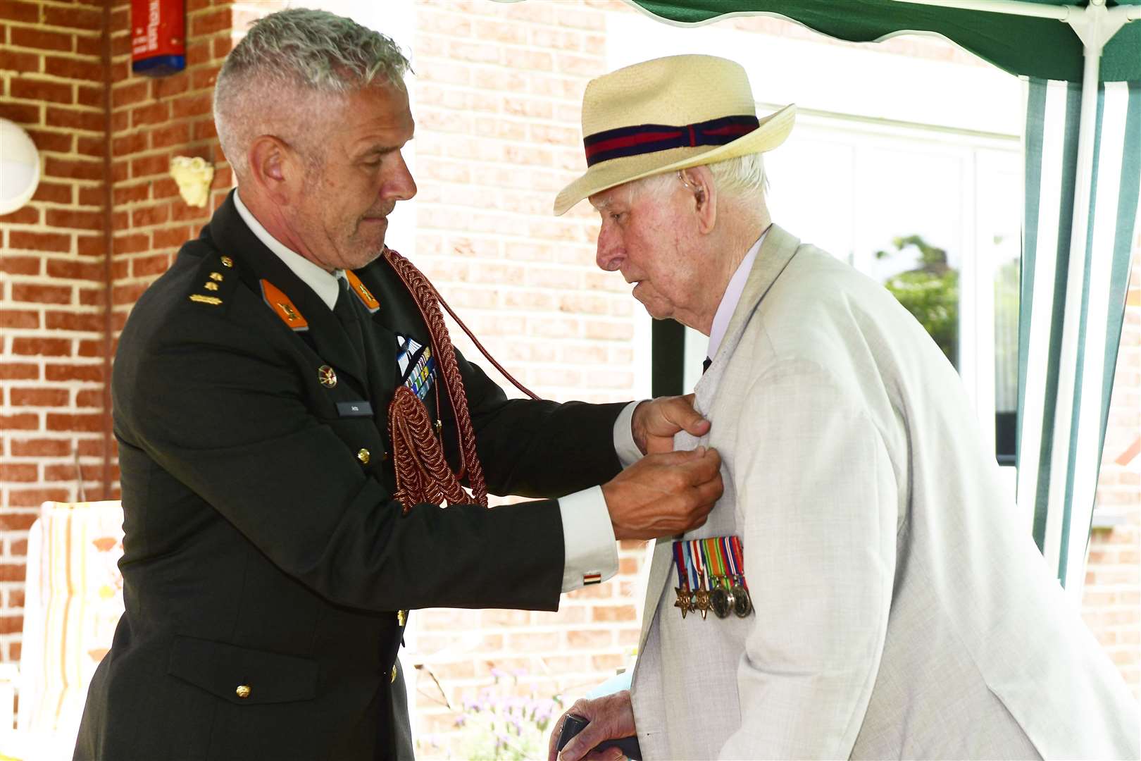 Roy Cook is presented with the Dutch Liberation Medal by Lieutenant Colonel Rob Arts, military attaché at the Dutch Embassy. Picture: Barry Goodwin