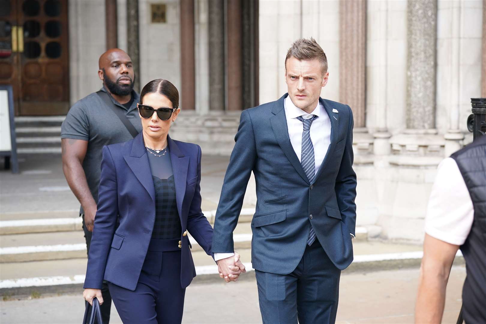 Rebekah and Jamie Vardy leave the Royal Courts Of Justice in London (Yui Mok/PA)