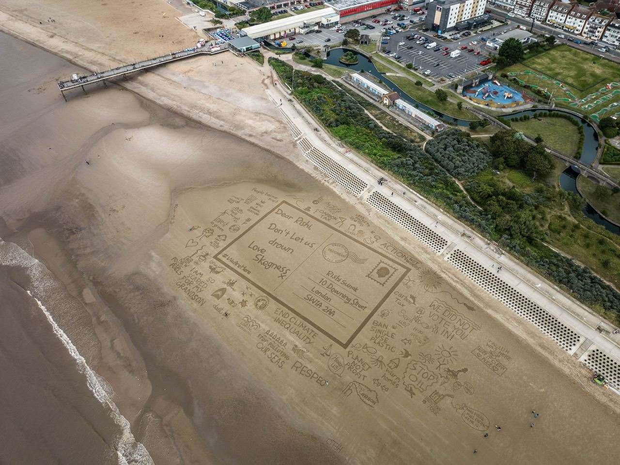 The sculpture was created on Skegness Beach to raise awareness of the impact of climate change on the UK’s most at-risk communities (Sand In Your Eye/Rights Community Action/PA)