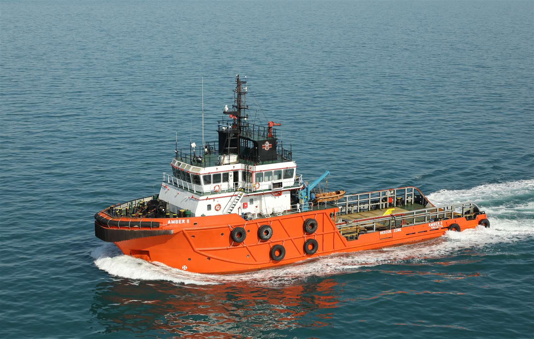 The Amber II tug has been accompanying the ship since leaving Tromso in Norway. Picture: Dover Strait Shipping