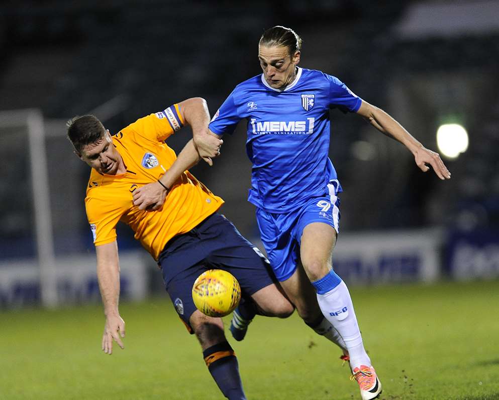 Gills striker Tom Eaves keeping the Oldham defence busy Picture: Ady Kerry