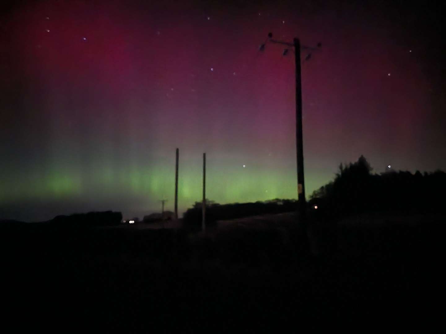 The northern lights over Blane Valley in the north of Glasgow (Paul Sweeney/PA)