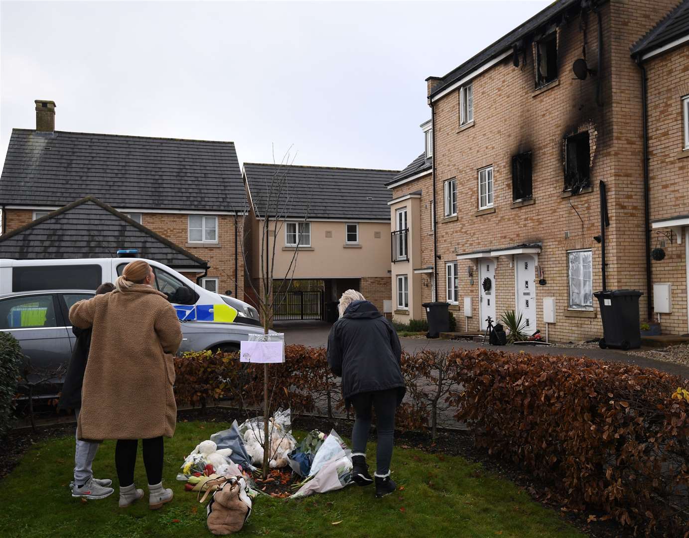 People leave floral tributes near the scene of the tragedy (Joe Giddens/PA)