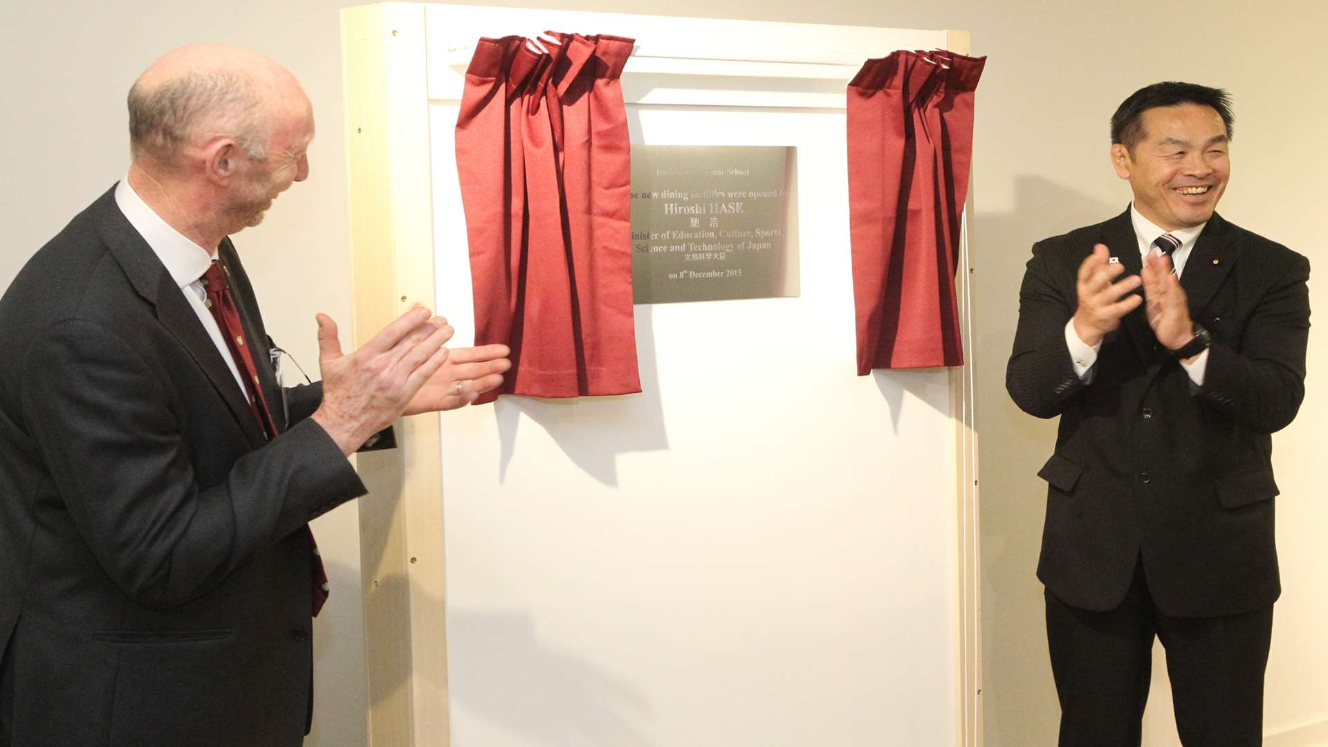 Mr Hase opens a new canteen with DGS head John Oakes.