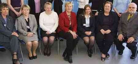 Regional marketing officer Terri McDonald, centre in red, with members of Gillingham KTS staff