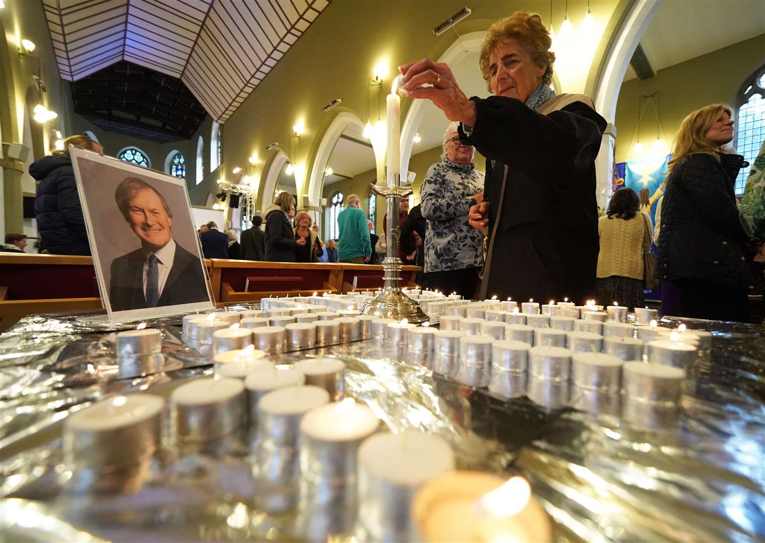 People light candles during a vigil at St Michael & All Angels church in Leigh-on-Sea. (Kirsty O’Connor/PA)