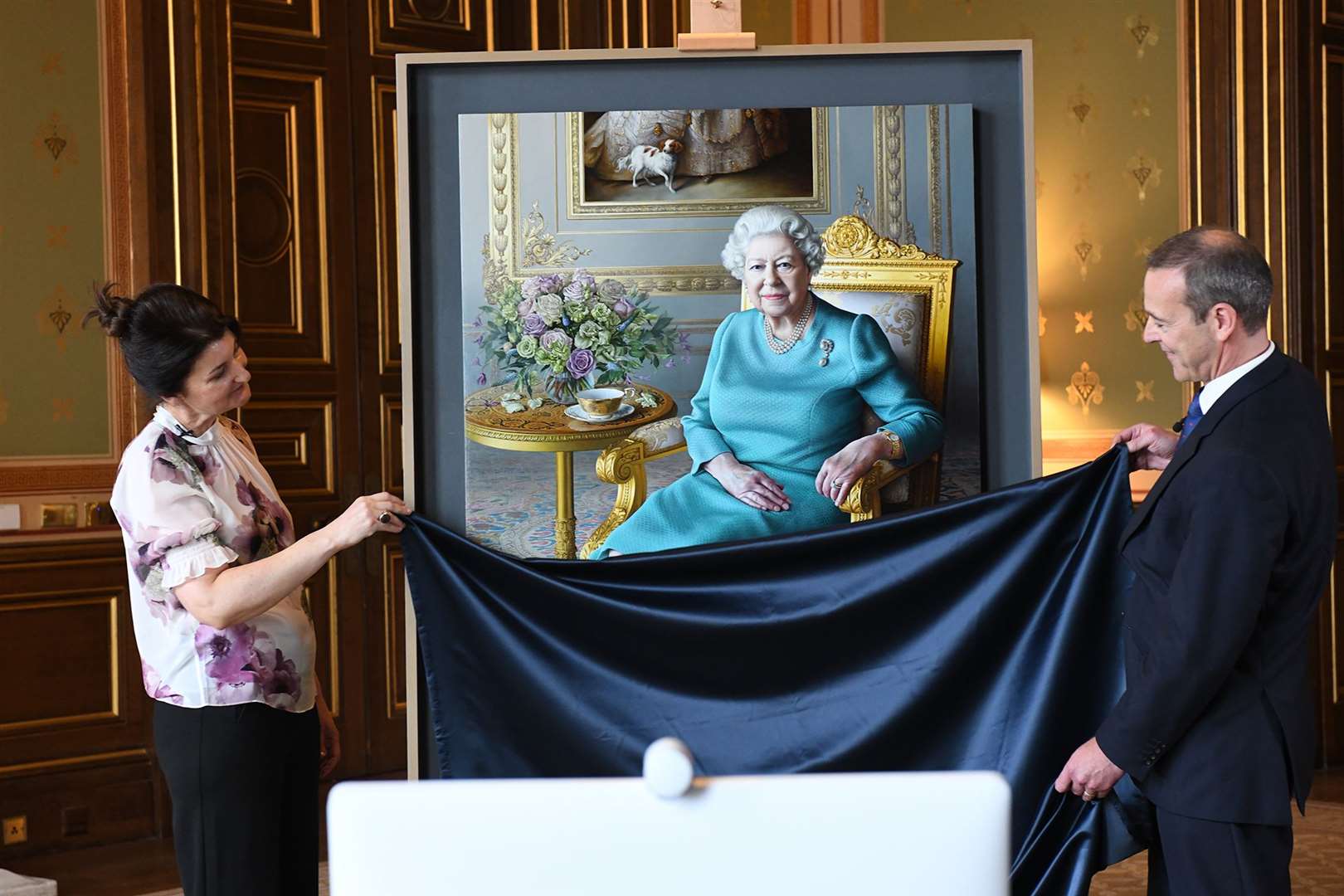 The portrait was unveiled by artist Miriam Escofet and Sir Simon McDonald from the Foreign Office (Foreign and Commonwealth Office/Crown Copyright/PA)