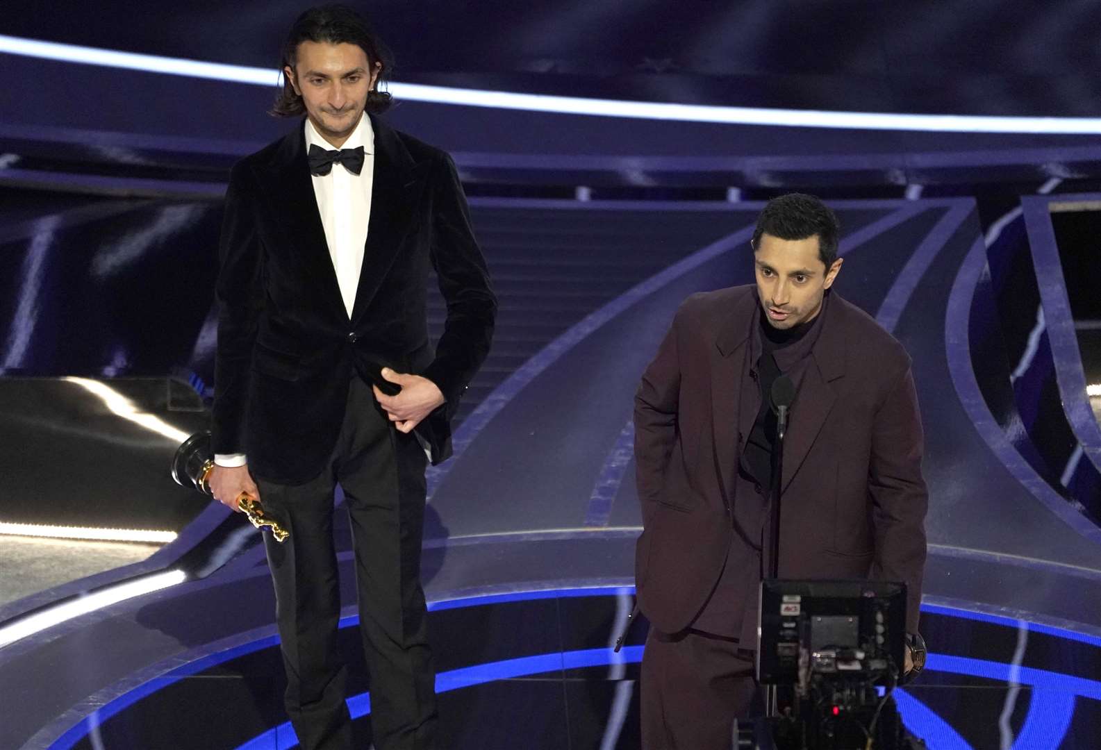 Aneil Karia, left, and Riz Ahmed accept the award for best live action short for The Long Goodbye at the 2022 Oscars (Chris Pizzello/AP)