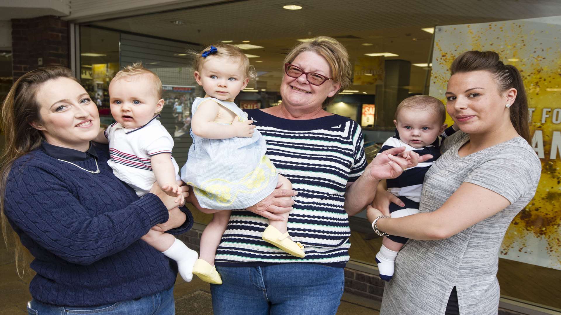 From left to right: Charlie Gaitens, with 3rd-placed Paisley-Ray Obee, six months, Susanne Bray with winner Emilia Turner Bray, 13 months, and Lennie Reeves, 6months, with Mia Hinds