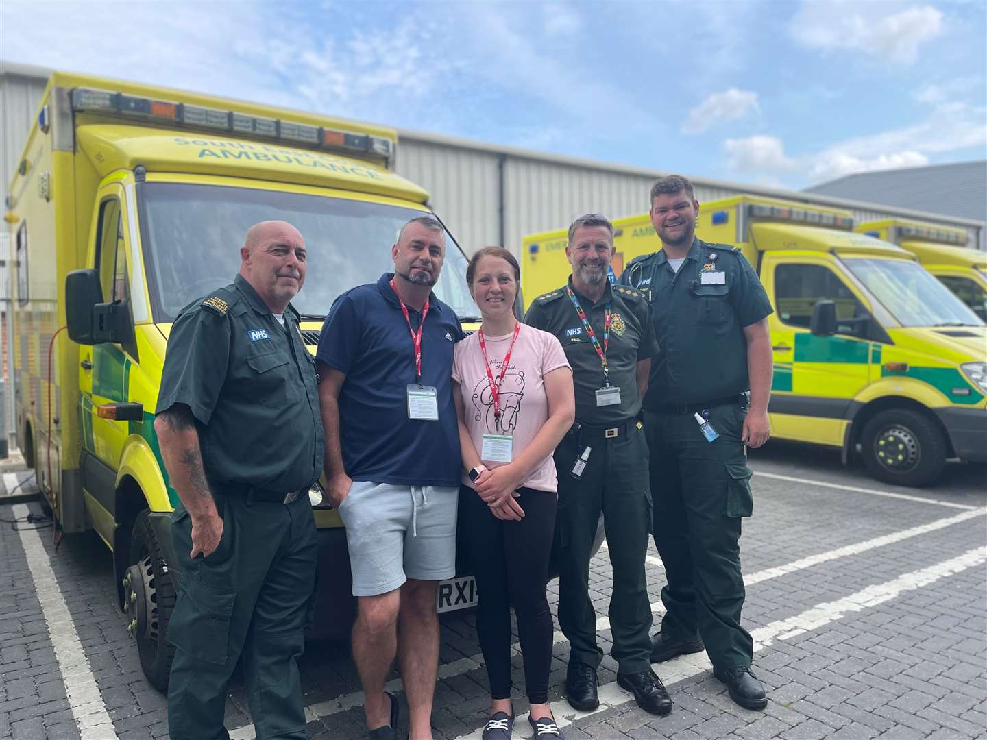 Richard and Gemma Ledger, from Sittingbourne, with the ambulance crew that saved Gemma's life. Picture: Secamb