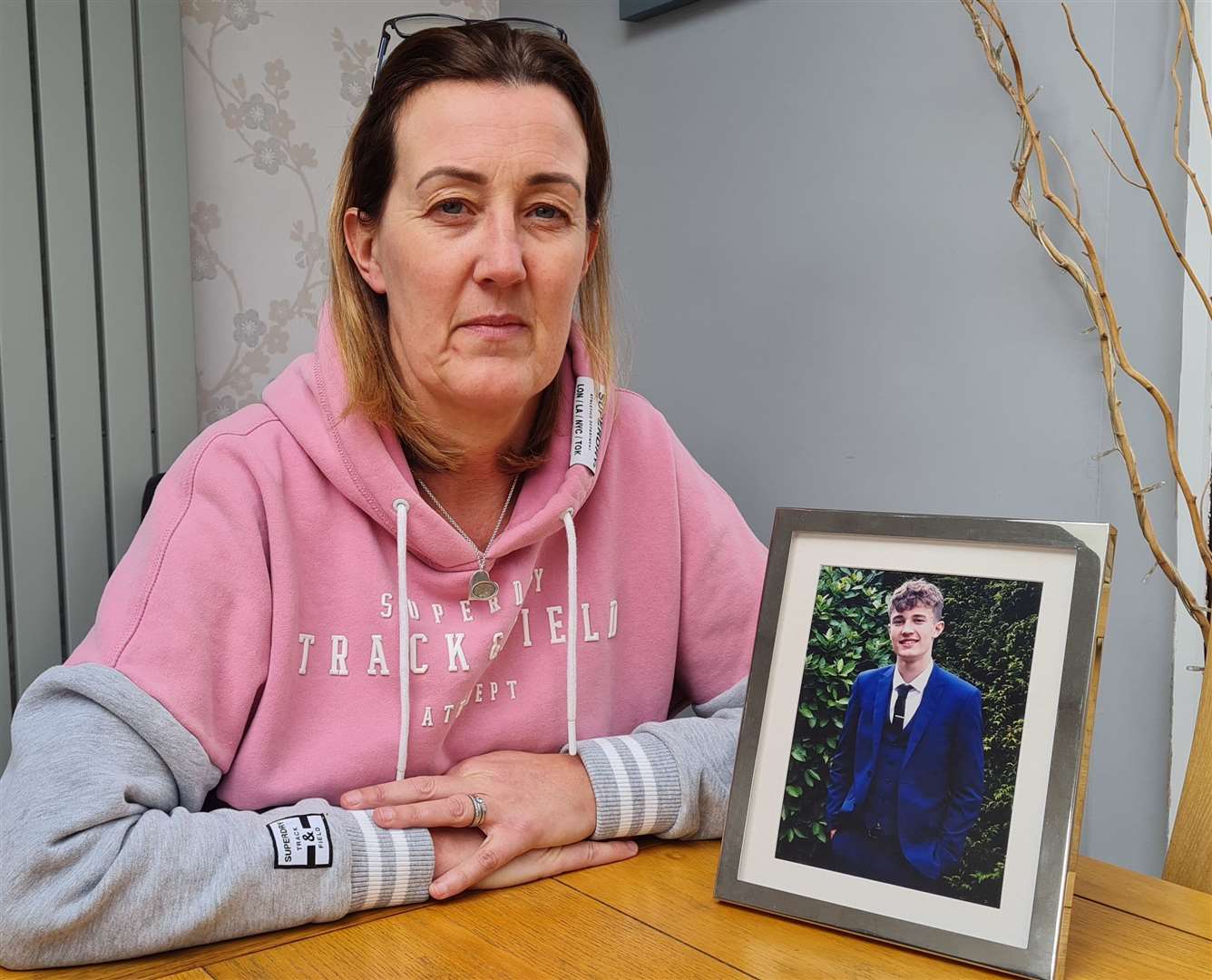 Kim Webster with a photo of her son, Will, who she says made a fatal mistake