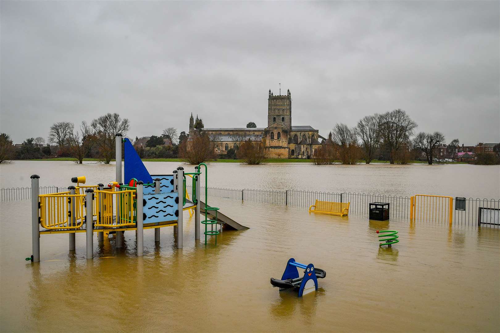 A child’s playground underwater in Tewkesbury in Gloucestershire (Ben Birchall/PA)