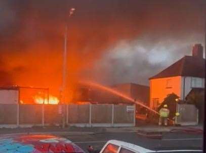 Firefighters battle the flames. Pic: Sara Parnell