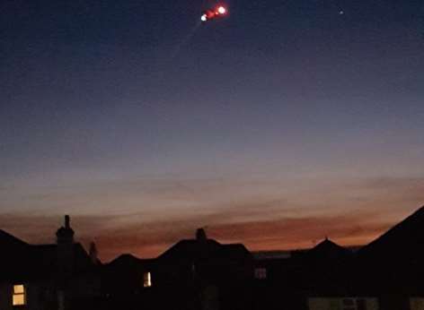 The helicopter spotted hovering above houses in Herne Bay. Picture: Suzi Ballnman via Kent_999s