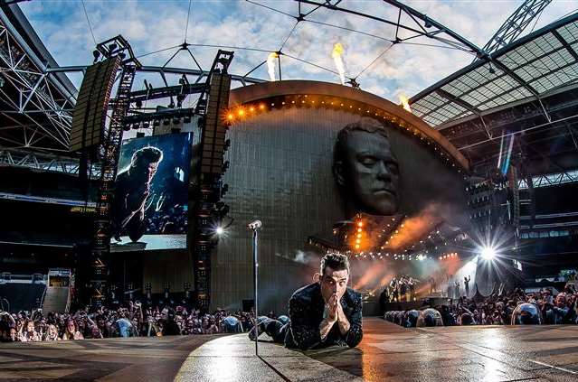 Robbie Williams performing Take The Crown