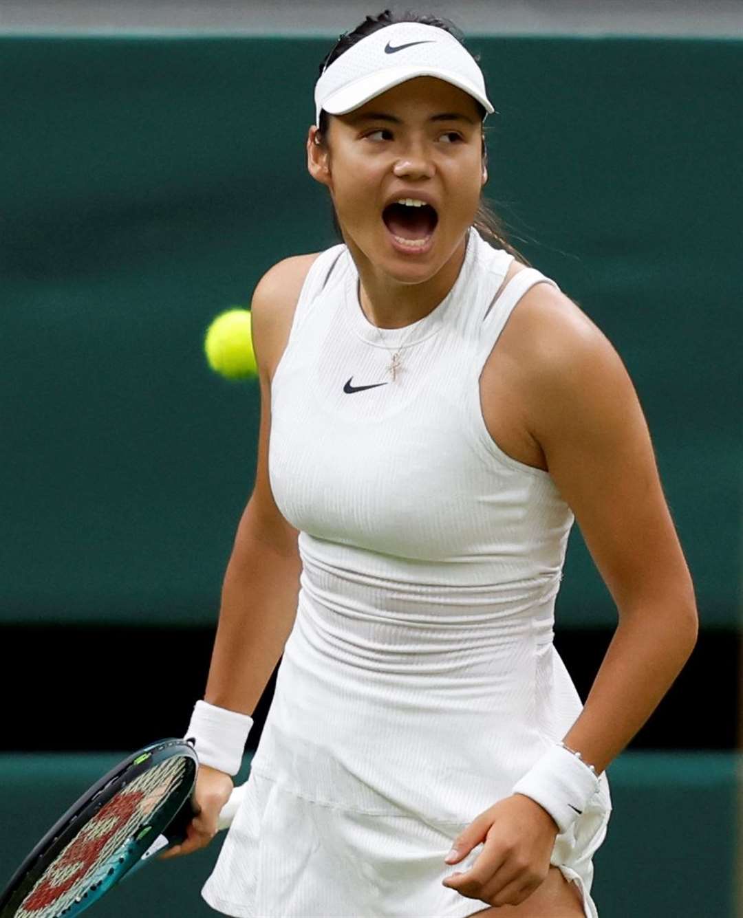 Emma Raducanu celebrates after winning a point in her quick-fire win against Elise Mertens at Wimbledon on Wednesday. Picture: Reuters via Beat Media subscription