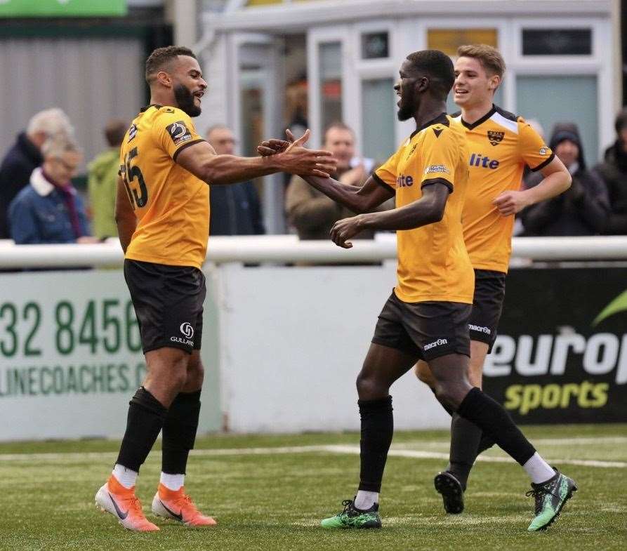 Dan Wishart celebrates his opener with Saidou Khan and Jake Embery Picture: Matthew Walker