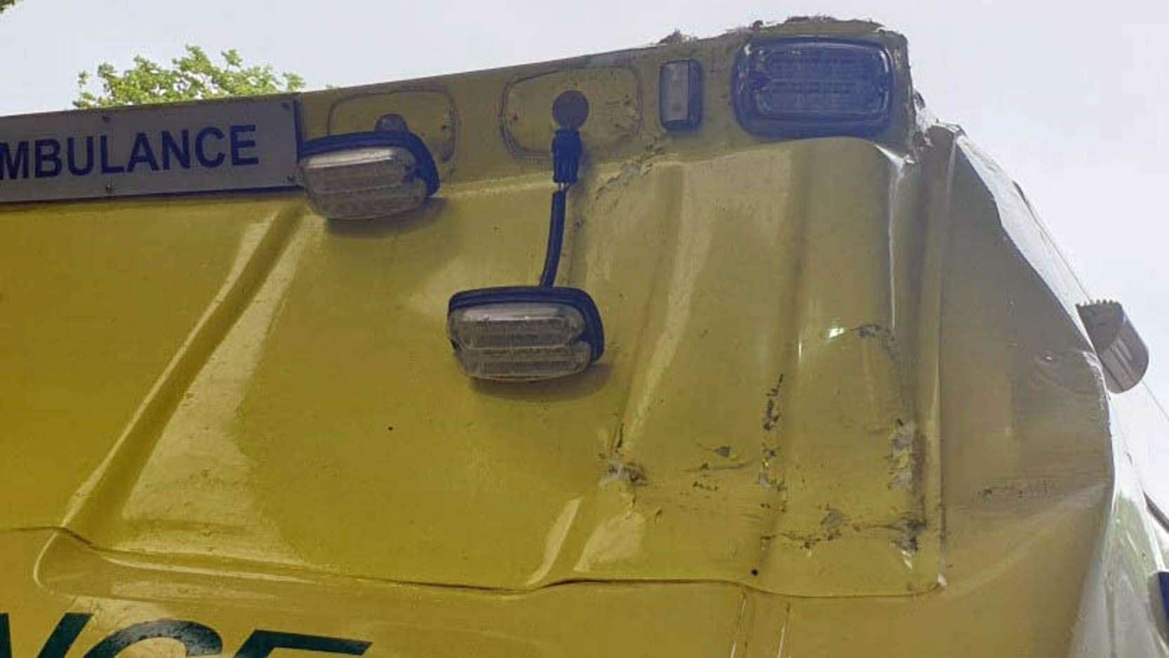 Damage caused to an ambulance on the M6 in Lancashire after a traffic cone was thrown from a motorway bridge (North West Ambulance Service/PA)