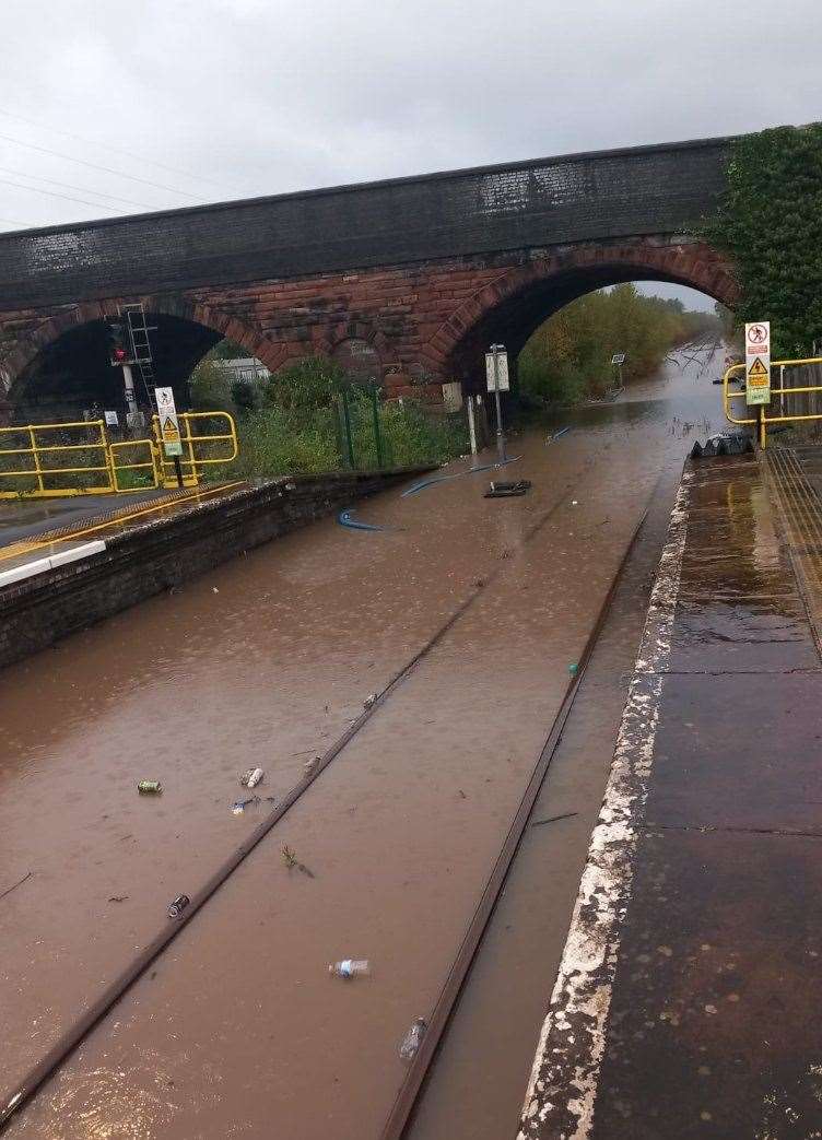 Flooded railway tracks at Hooton, Merseyside (Merseyrail/PA)