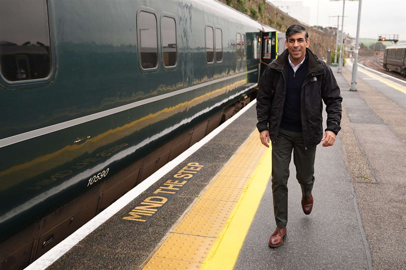 Rishi Sunak arrives at a station in Cornwall (Aaron Chown/PA)