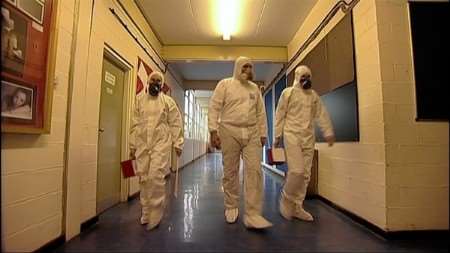 A survey team inspect the buildings of Chaucer Technology School during filming of BBC South East's Inside Out programme investigating the spread of asbestos in the county's schools.