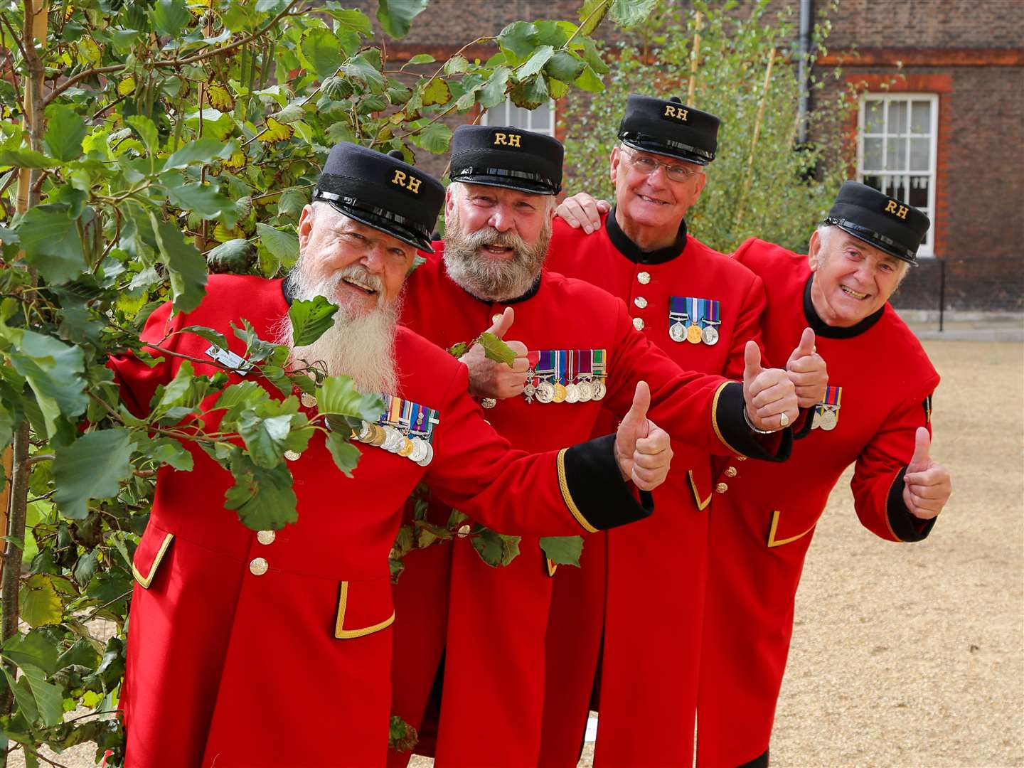 Chelsea Pensioners with trees from The Queen’s Green Canopy during a gifting ceremony at The Royal Hospital Chelsea in London (Claire Kramer for The Queen’s Green Canopy/PA)