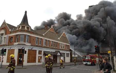 Firefighters at the scene of the blaze. Picture courtesy JOHN BOWNAS