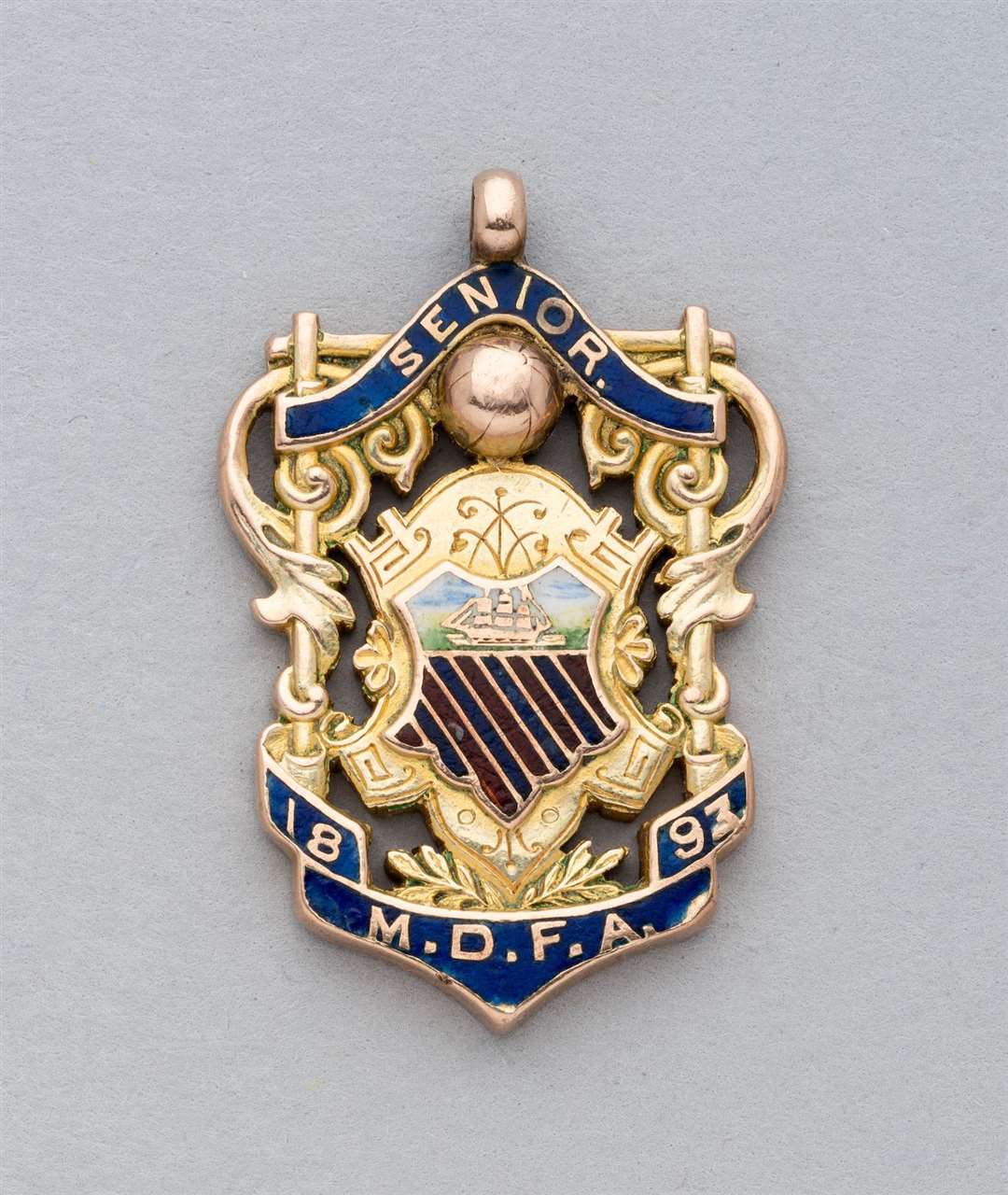 The earliest Manchester United football medal, when the club was known as Newton Heath, is also being sold (Graham Budd Auctions/PA)