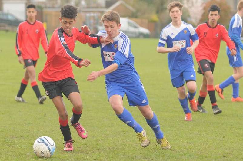 Rainham Kenilworth Athletic's under-15s (red) hold off Rainham 84 in the League Cup semi-final Picture: Steve Crispe