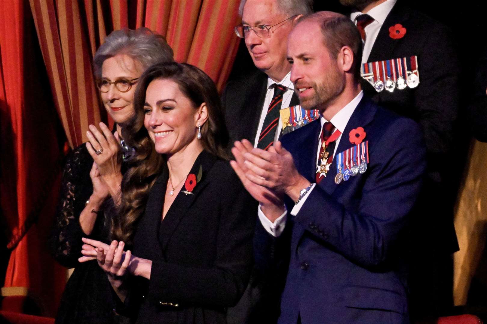 William and Kate were both wearing poppies (Chris J Ratcliffe/PA)