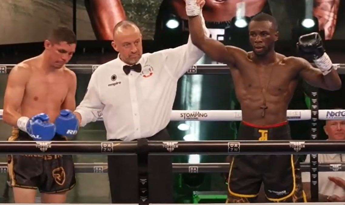 Chatham's Tumi Phillips has his hand raised by the referee after beating Christian Lopez Flores Picture: Top Tier Boxing YouTube