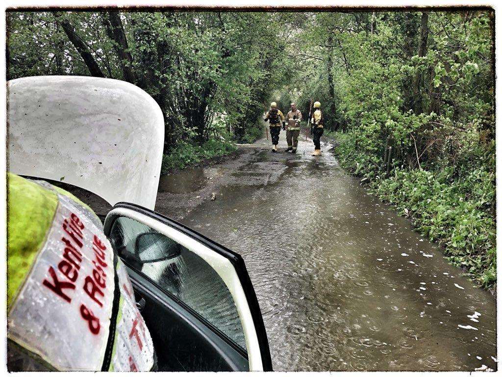 The family were taken to safety after flooding trapped them in their car. Picture: Kent Fire and Rescue Service