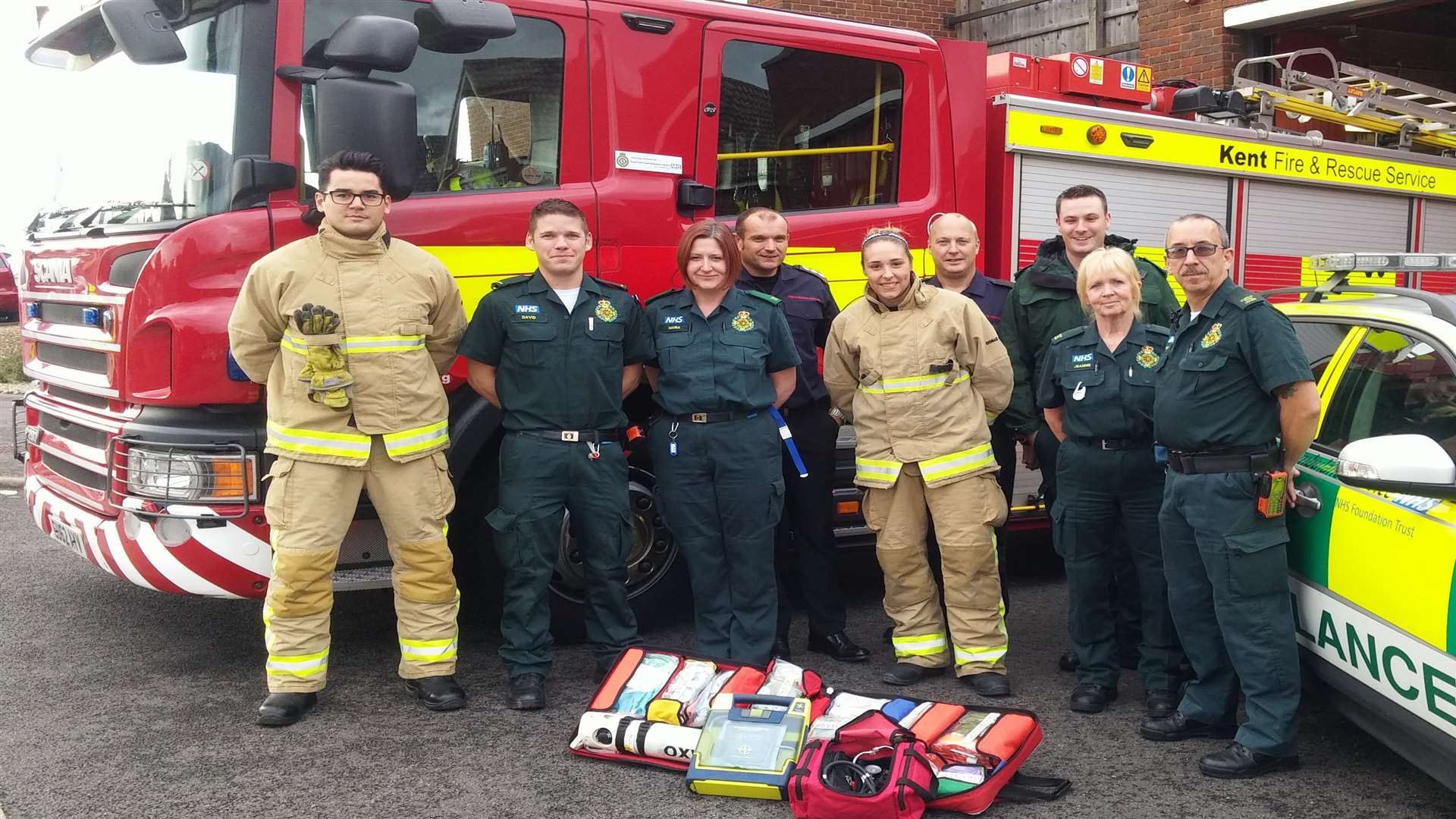 Sittingbourne firefighters with members of the ambulance crew