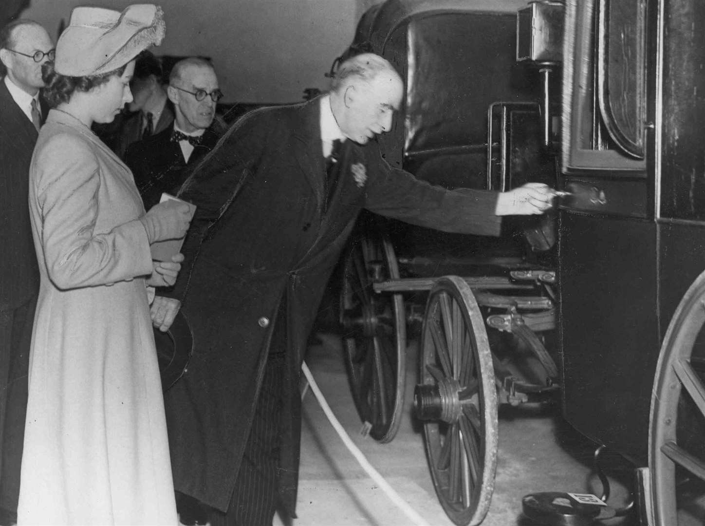 November 1946: Princess Elizabeth with Sir Garrard Tyrrwhitt-Drake at the Carriage Museum in Maidstone