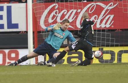 Keeper Rob Elliot is unable to stop Nathan Tyson from scoring the opening goal. Picture: Barry Goodwin