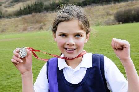 Hannah Griggs, nine, winner of the 3 and 4 year girls race.