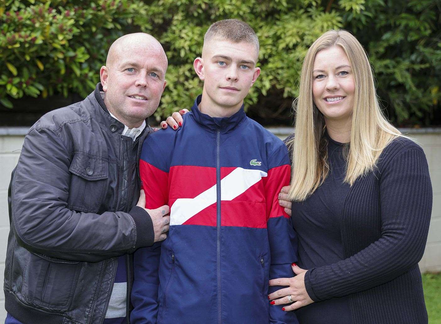 George with mum Natalie and dad Rick (42576787)