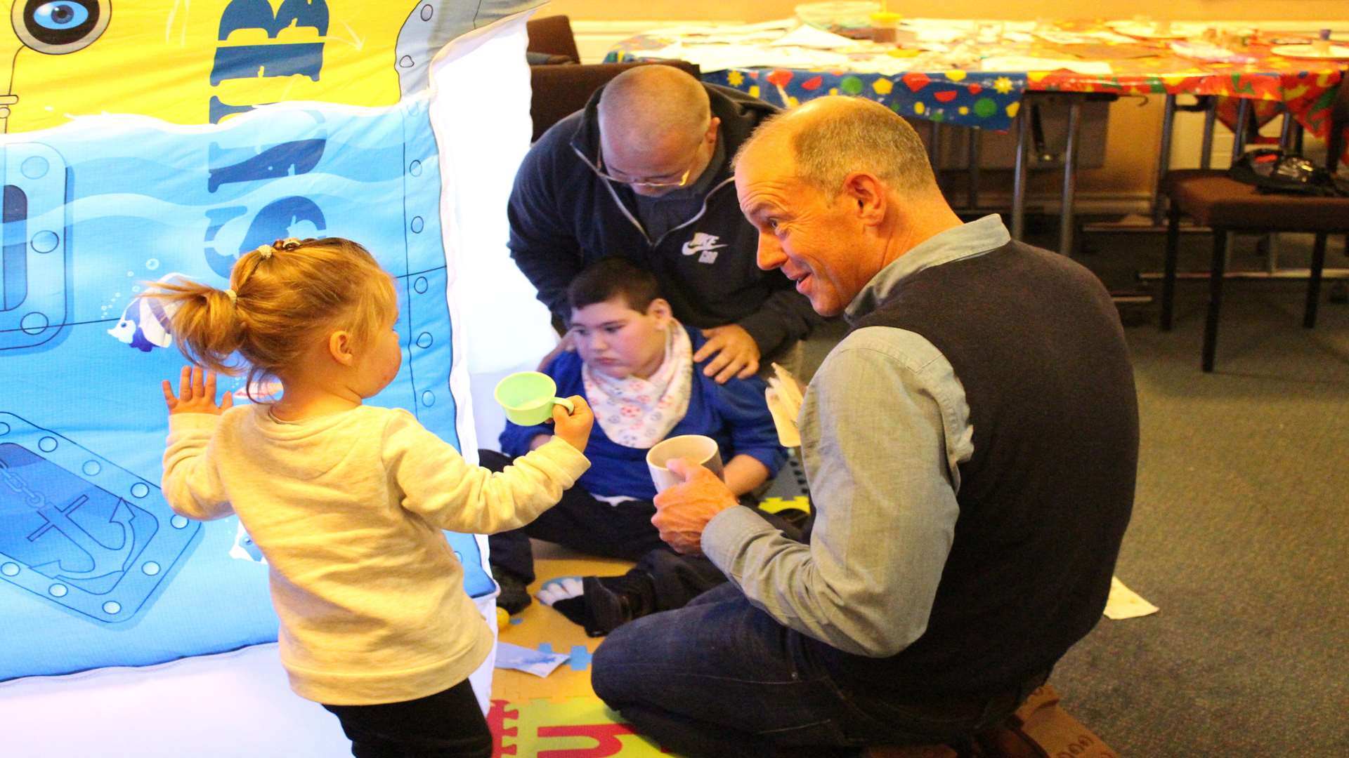 Tea time playtime for Phil and some youngsters