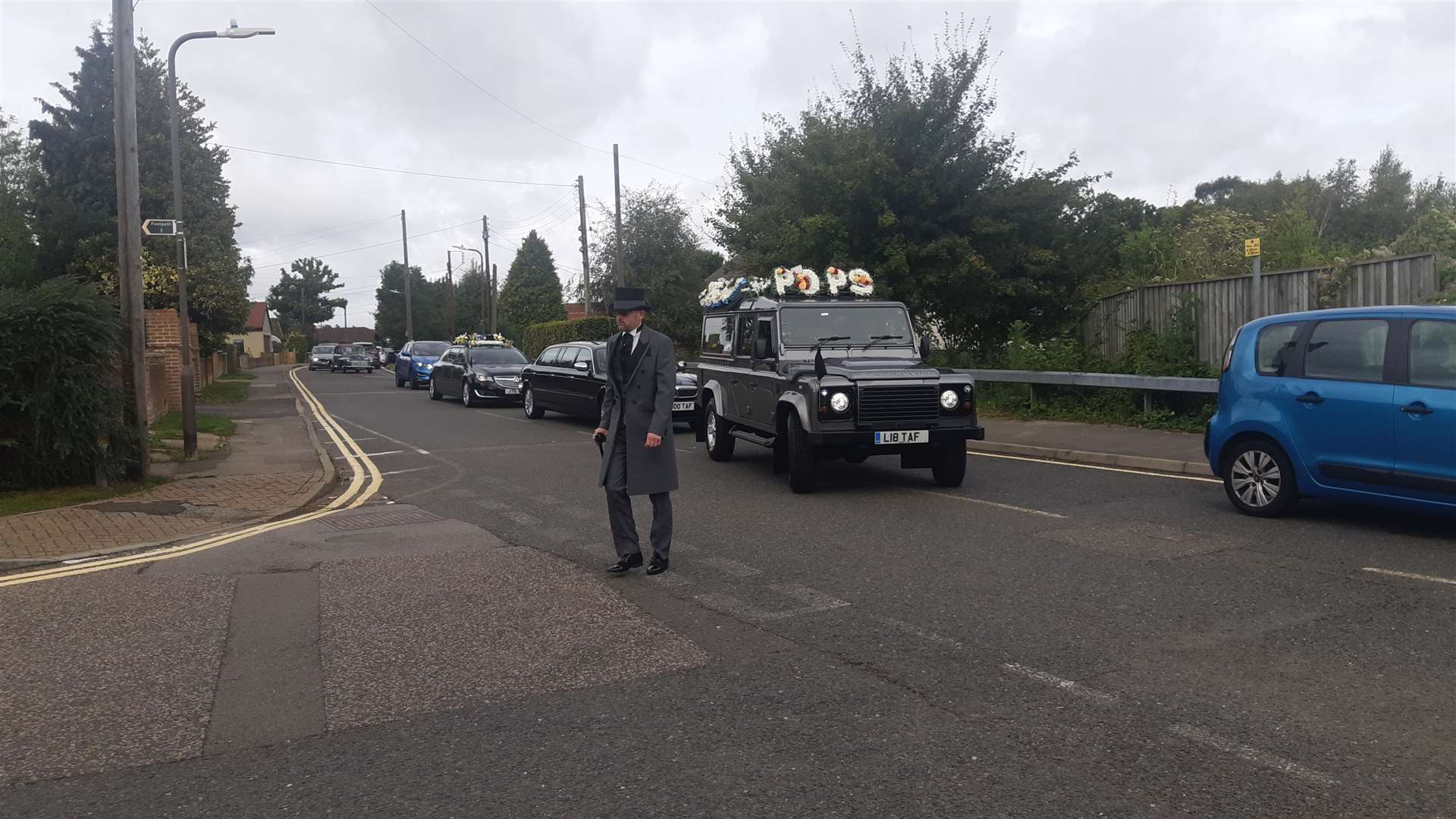 Mark Allen leads the procession into Medway Crematorium for his father Terry Allen's funeral