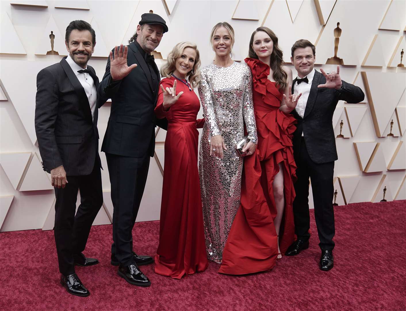 Sian Heder (centre) with Eugenio Derbez, Troy Kotsur, Marlee Matlin, Sian Heder, Emilia Jones, and Daniel Durant (Jae C. Hong/AP)