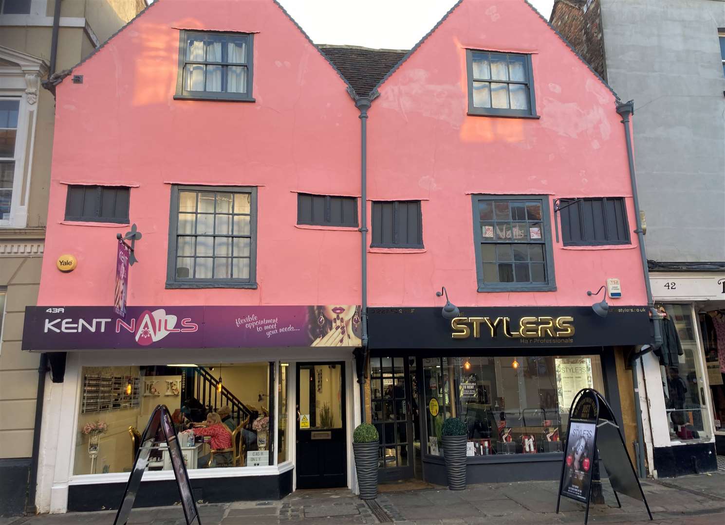 Canterbury landlord warned he could face jail after painting shops pink ...